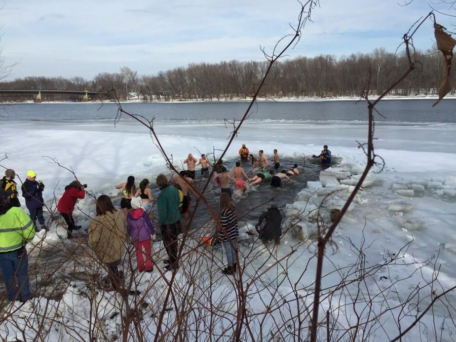Students brave icy waters to take the plunge