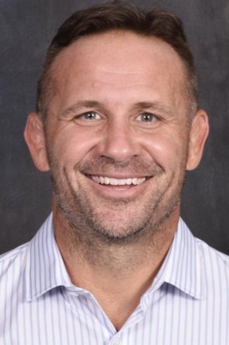 Wrestling coach receives two-game suspension