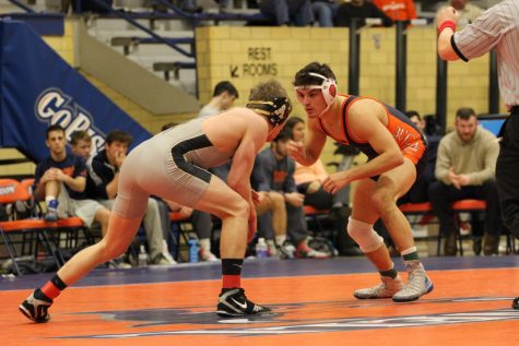 Wrestling falls short to Army West Point, Smith wins 100th career fight