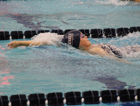 Swimming and diving splits weekend at Loyola