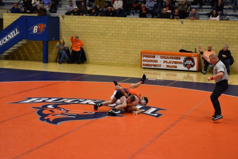 Wrestling overcomes Harvard and Brown
